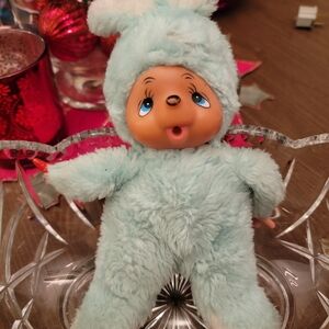 This is a vintage 1977 Russ Berrie "Munchin" blue bunny rabbit plush doll. 